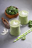 Green smoothie with banana, chia and kale photo