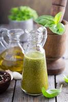 Aromatic olive oil with basil photo
