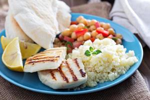 Middle East style meal with couscous and chickpeas photo