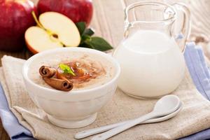 Rice pudding with syrup and berries photo