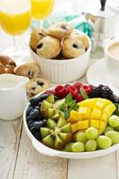 Fresh and bright continental breakfast table photo