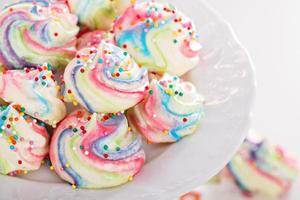 Colorful meringues rainbow colors photo