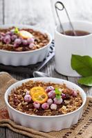 Baked oatmeal with carrot, walnuts and raisins photo