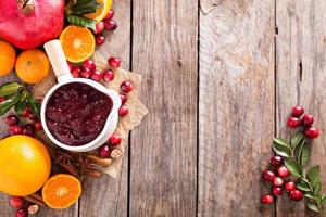 Cranberry sauce in ceramic saucepan photo