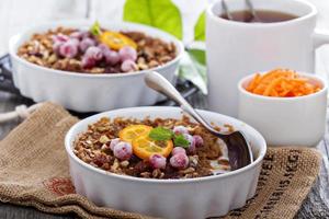 Baked oatmeal with carrot, walnuts and raisins photo