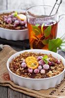 Baked oatmeal with carrot, walnuts and raisins photo