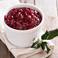 Cranberry sauce in ceramic ramekin photo