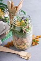 Assembling a mason jar salad