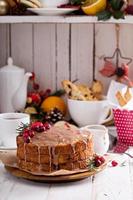 Orange and cranberry christmas cake with glaze photo