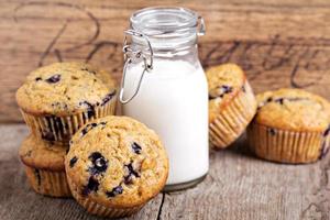 Healthy blueberry banana muffins with milk photo