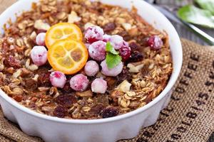 Baked oatmeal with carrot, walnuts and raisins photo