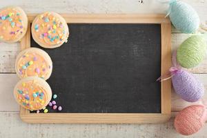 Easter background with pastel cookies photo