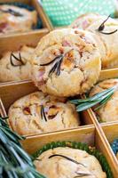 Savory muffins with herbs, tomatoes and ham photo