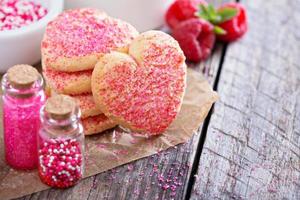 galletas de azúcar del día de san valentín con chispas foto