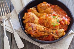 Chicken with mustard and red peppers photo