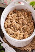 Peach crumble in a baking dish photo