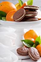 Chocolate orange cookies with cream filling photo