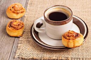 Cinnamon rolls with coffee photo