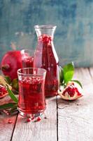 Pomegranate drink with sparkling water photo