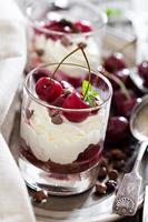 Sweet cherry cheesecake in a glass photo