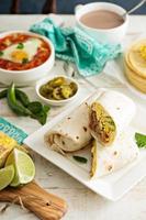 Breakfast burritos with eggs and potatoes photo