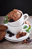 Chocolate cookies stacked in coffee cups photo