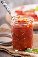 Pizza sauce in a jar selective focus photo
