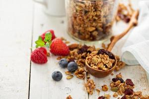 Homemade granola with milk for breakfast photo