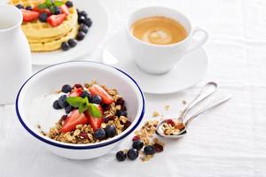 Breakfast bowl with homemade granola photo