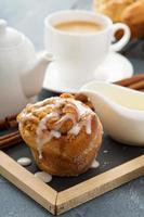 Cinnamon bun for breakfast photo