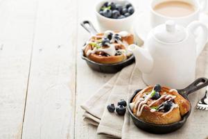 Cinnamon bun for one in a tiny skillet photo