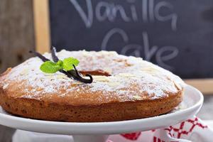 Vanilla and almond cake on a stand photo