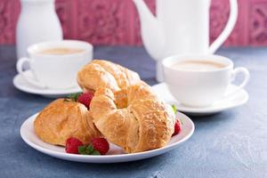 Freshly baked croissants for breakfast photo