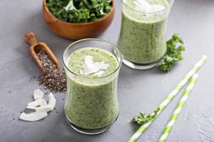 Green smoothie with banana, chia and kale photo