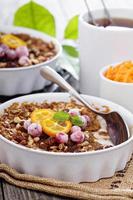 Baked oatmeal with carrot, walnuts and raisins photo