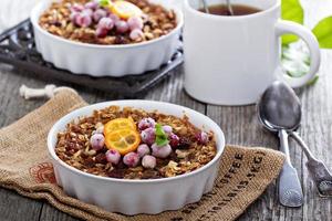 Baked oatmeal with carrot, walnuts and raisins photo