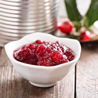 Storebought cranberry sauce in small dish photo