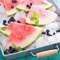 Watermelon slices on ice photo