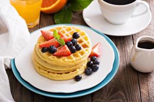 Breakfast waffles with fresh berries photo