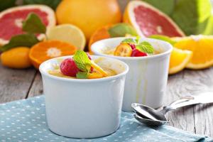 Citrus pudding in white ramekins photo