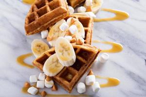 Waffles with peanut butter and bananas photo