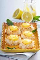 Coconut macaroon cookies with lemon curd photo