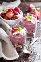 Strawberry chia pudding in glasses photo