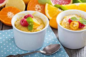 Citrus pudding in white ramekins photo