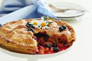 Peach and blueberry summer pie photo