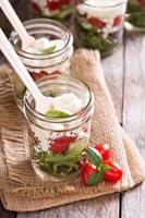 Greek vegetable salad in a jar photo