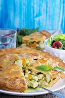 Savory pie with chicken photo