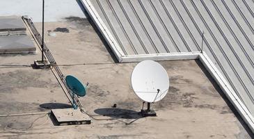 Old big telecommunication satellite dish. photo