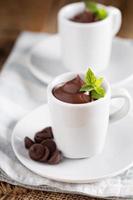 Chocolate pudding in small cups photo