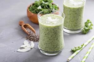 Green smoothie with banana, chia and kale photo